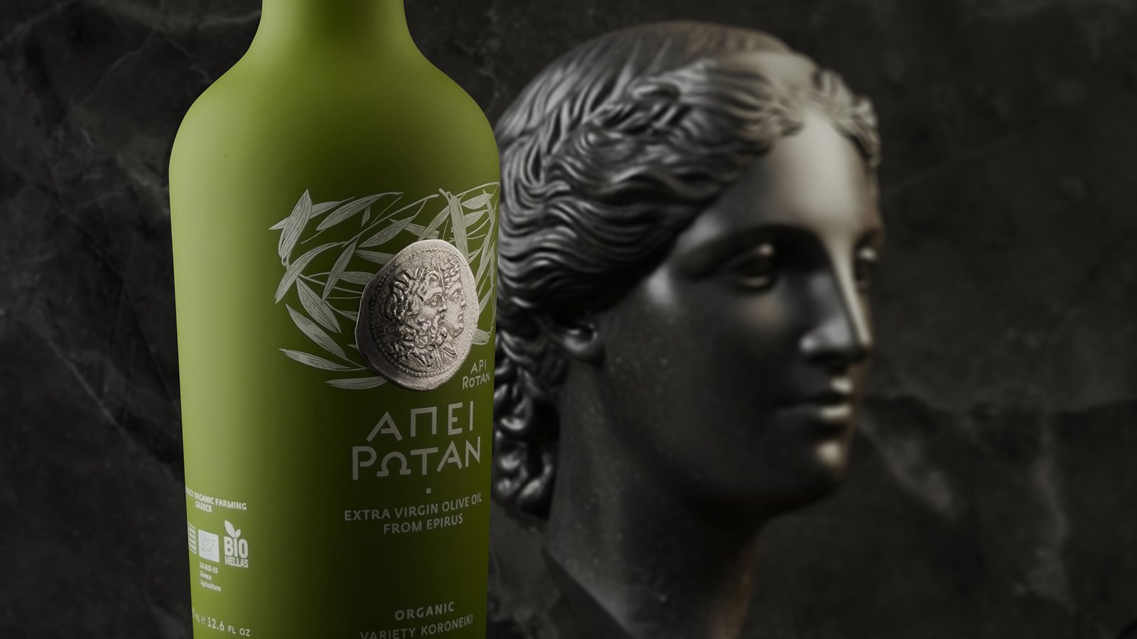 APEI ROTAN Organic Extra Virgin Olive Oil, Koroneiki variety, featuring the ancient coin with Dione, symbolizing fertility, nature, and balance within the Epirus-inspired identity.